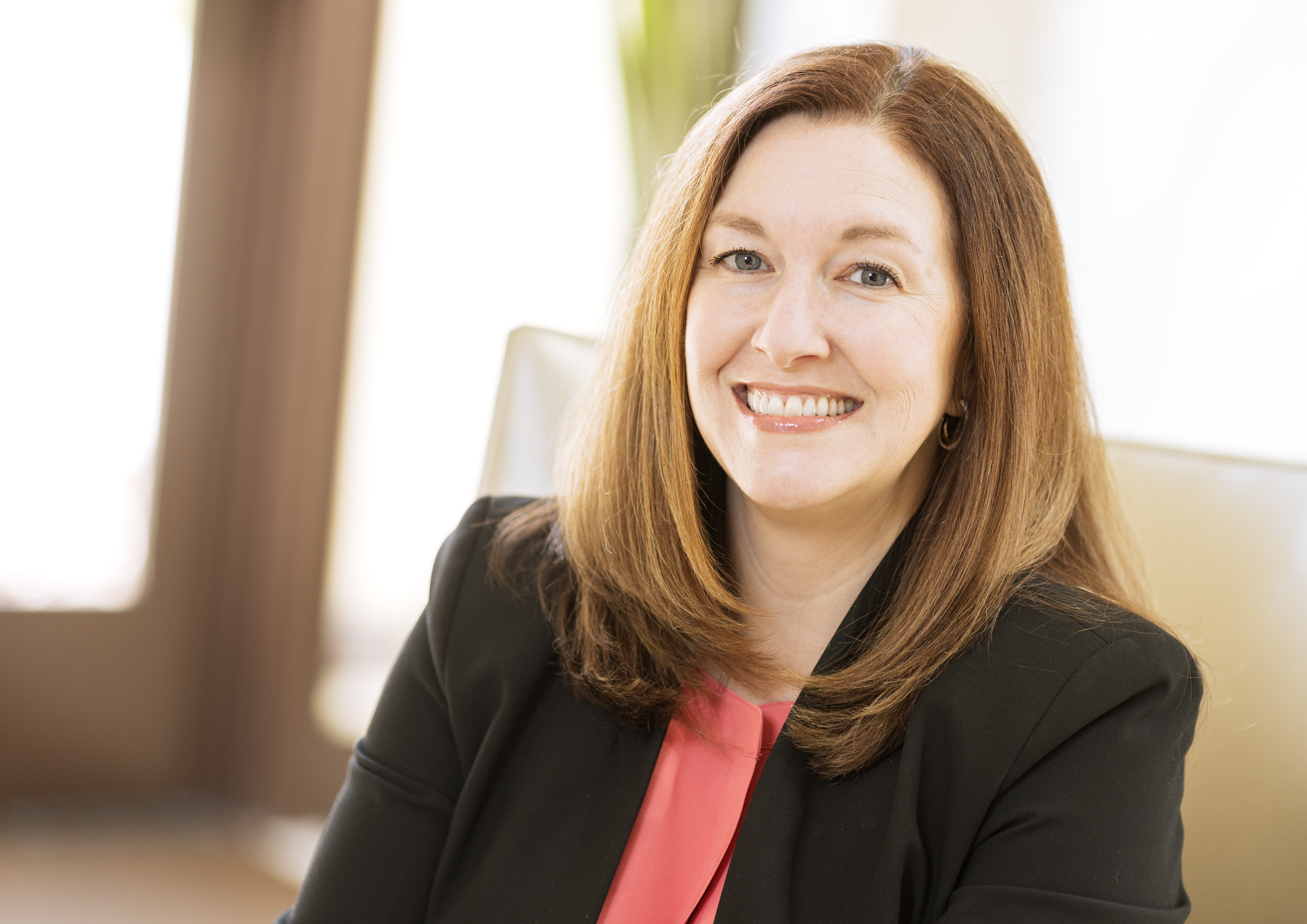 Carrie Ruddy seated at leadership summit